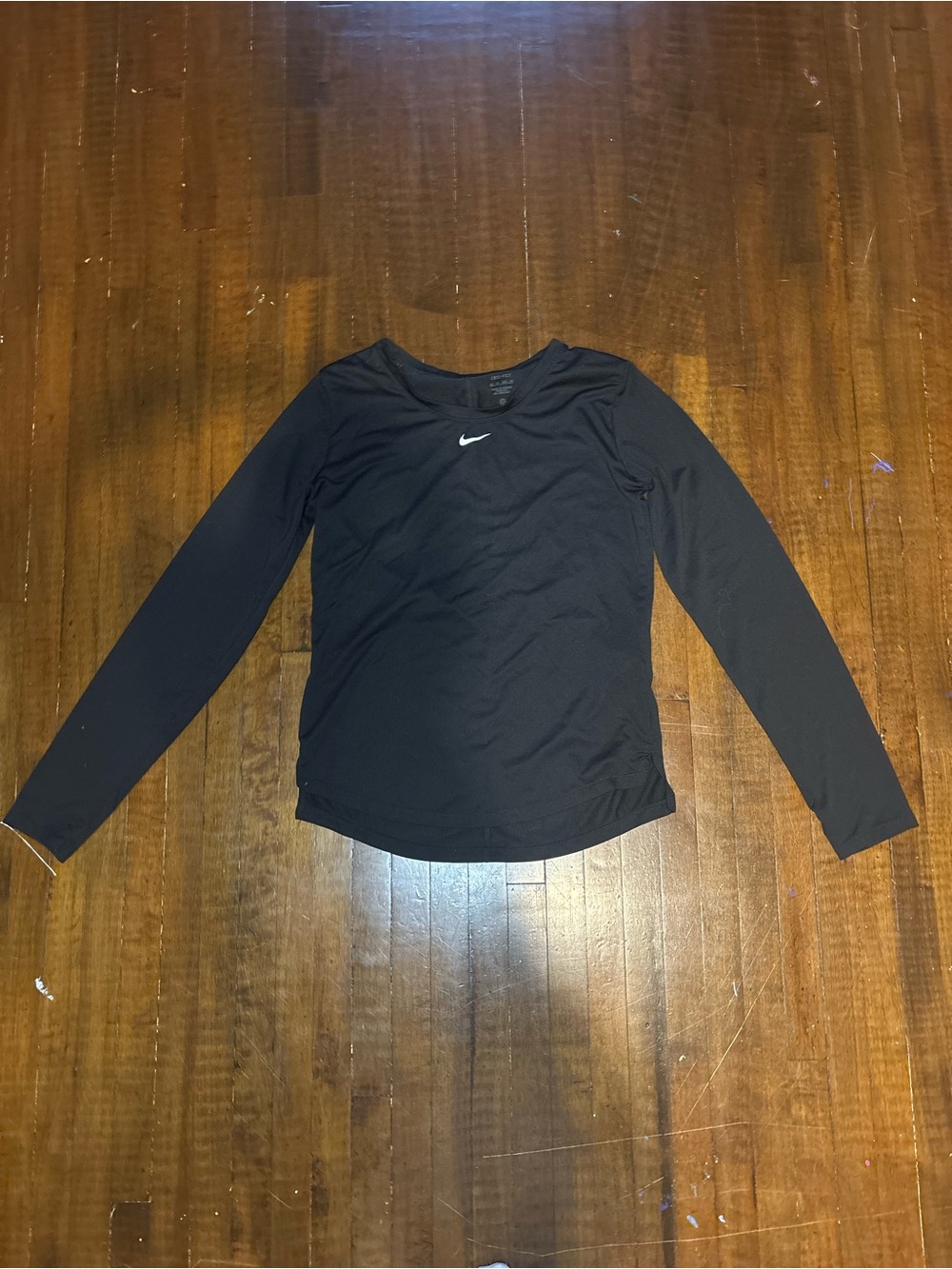 Nike Black Long Sleeve Athletic Top with White Swoosh